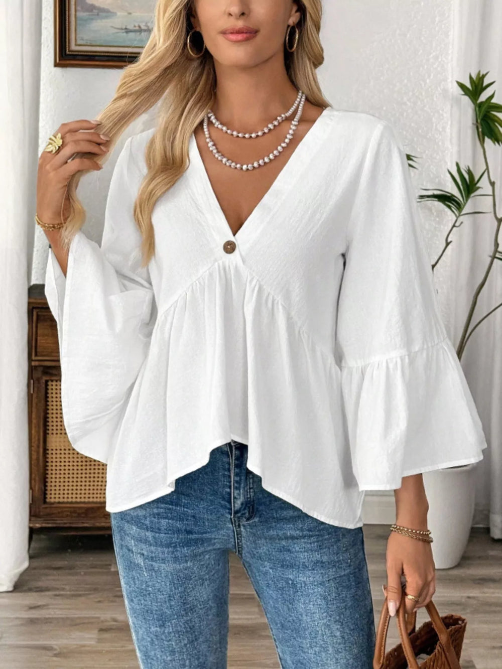 Blusa boho con cuello en V y manga ancha