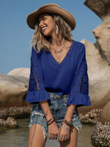 Blusa plisada con detalle de encaje y manga 3/4