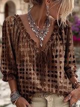 Blusa elegante con lazo al cuello y manga 3/4