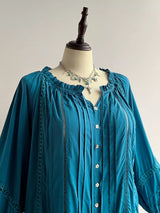 Blusa boho plisada con volantes y manga abombada