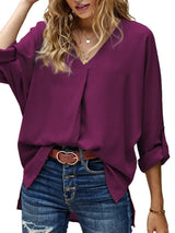 Blusa plisada elegante con cuello en V y manga larga