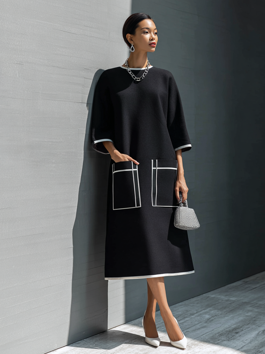 Vestido midi con bolsillo y costuras en contraste