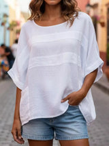 Blusa oversize de rayas con cuello redondo
