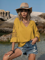 Blusa plisada con detalle de encaje y manga 3/4