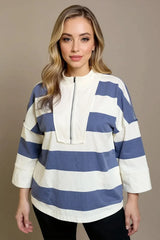 Blusa de rayas cuello alto con media cremallera