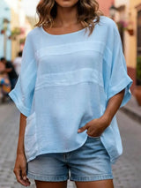 Blusa oversize de rayas con cuello redondo