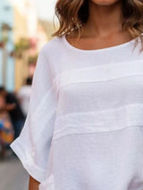 Blusa oversize de rayas con cuello redondo