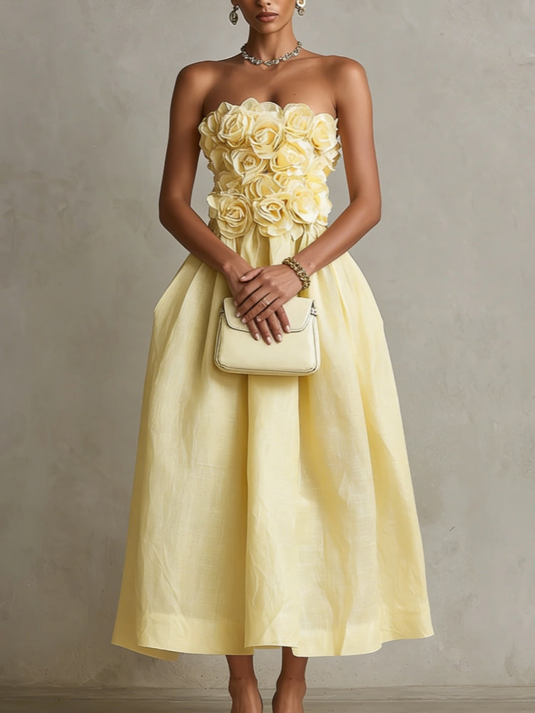 Vestido midi amarillo sin tirantes con flor 3D