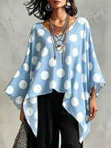 Blusa de lunares con bajo asimétrico