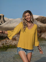 Blusa plisada con detalle de encaje y manga 3/4