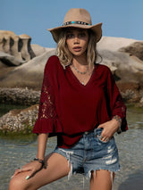 Blusa plisada con detalle de encaje y manga 3/4