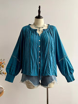 Blusa boho plisada con volantes y manga abombada