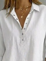Blusa con botones a presión y manga 3/4