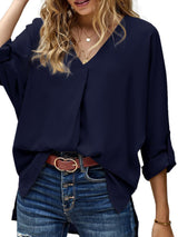 Blusa plisada elegante con cuello en V y manga larga