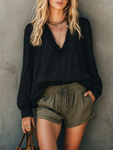 Blusa boho con cuello en V, volantes y manga larga