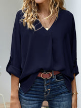 Blusa plisada elegante con cuello en V y manga larga