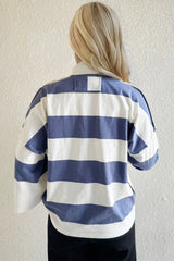 Blusa de rayas cuello alto con media cremallera