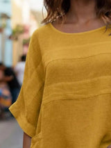 Blusa oversize de rayas con cuello redondo