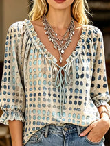 Blusa elegante con lazo al cuello y manga 3/4
