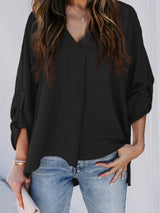 Blusa plisada elegante con cuello en V y manga larga