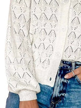 Cárdigan chic de cuello en V con detalles calados