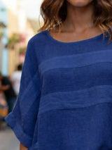 Blusa oversize de rayas con cuello redondo