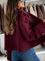 Chaqueta cropped acolchada con solapa y doble botonadura