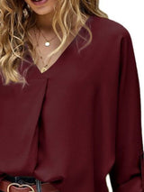 Blusa plisada elegante con cuello en V y manga larga