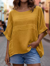 Blusa oversize de rayas con cuello redondo