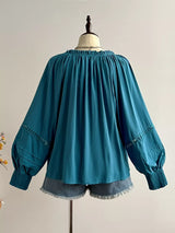 Blusa boho plisada con volantes y manga abombada