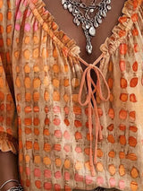 Blusa elegante con lazo al cuello y manga 3/4