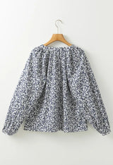 Blusa estampado floral con cuello en V y manga larga