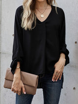 Blusa plisada elegante con cuello en V y manga larga
