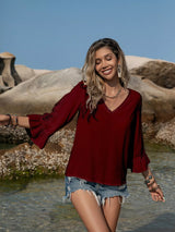 Blusa plisada con detalle de encaje y manga 3/4