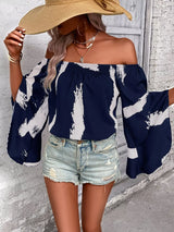 Blusa boho bicolor con hombros descubiertos