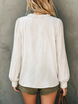 Blusa boho con cuello en V, volantes y manga larga
