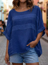 Blusa oversize de rayas con cuello redondo