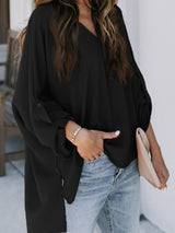 Blusa plisada elegante con cuello en V y manga larga