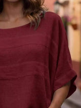 Blusa oversize de rayas con cuello redondo