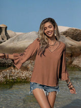 Blusa plisada con detalle de encaje y manga 3/4