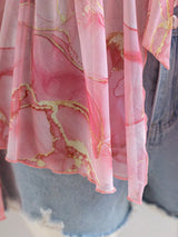 Blusa de gasa plisada con lazo y estampado floral