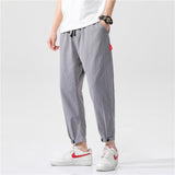 Theo - Pantalones Ajustados de Algodón