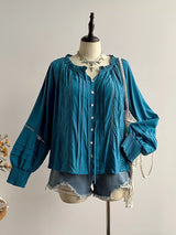 Blusa boho plisada con volantes y manga abombada
