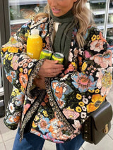 Chaqueta larga acolchada floral con forro sherpa
