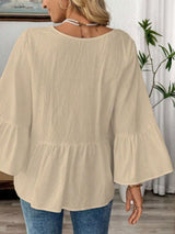Blusa boho con cuello en V y manga ancha