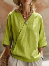 Blusa boho cruzada con cuello en V y manga 3/4
