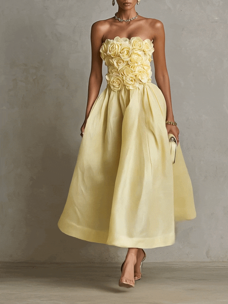 Vestido midi amarillo sin tirantes con flor 3D
